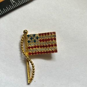 Vintage rhinestone patriotic flag lapel pin brooch.